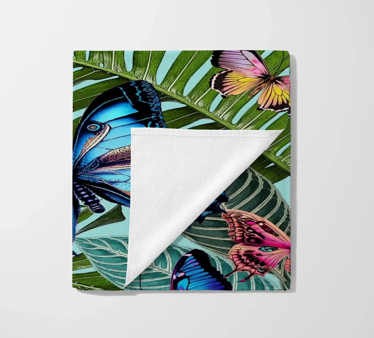 Giungla di farfalle luminose telo mare da Nina May Design Studio