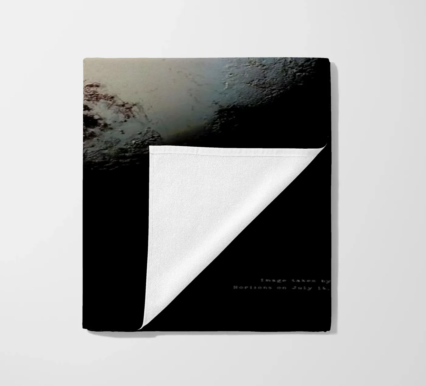 Pluto, NASA beach towel by Vintage by JUNIQE