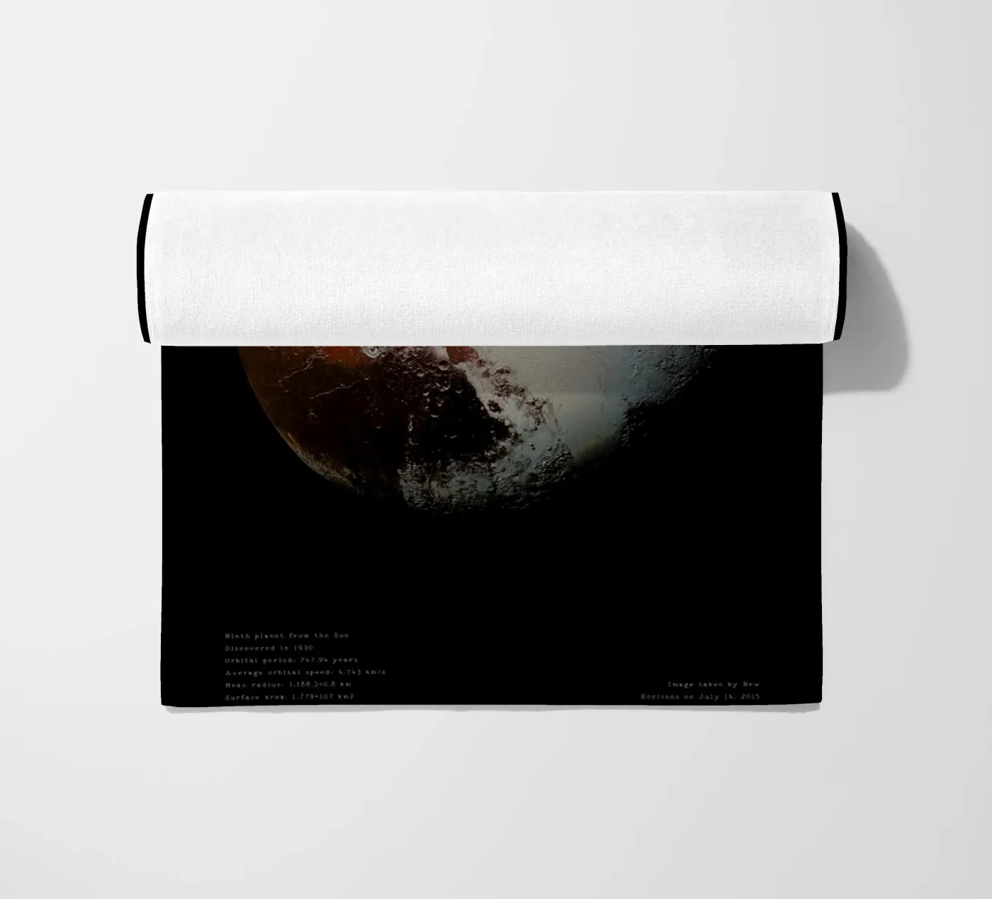 Pluto, NASA beach towel by Vintage by JUNIQE