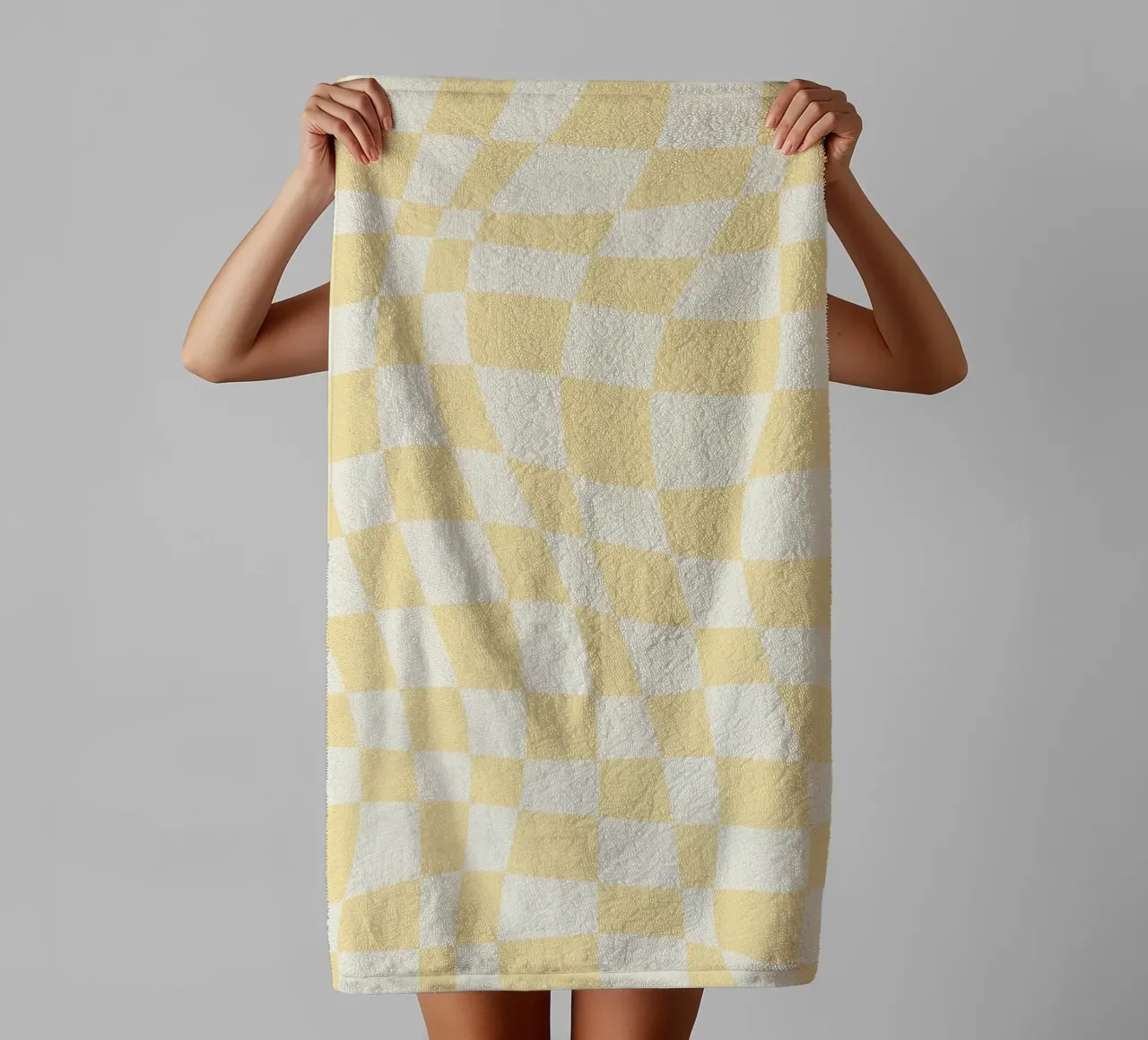 Damier ondulé jaune pâle serviette de bain de Little Dean