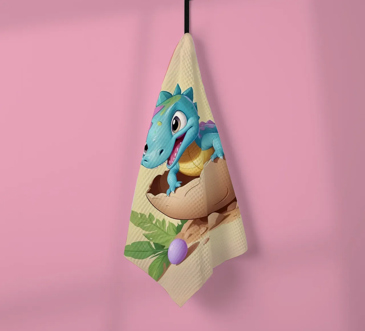 Dinosaure mignon sortant de l'œuf avec un sourire radieux torchon de DesignDoodle