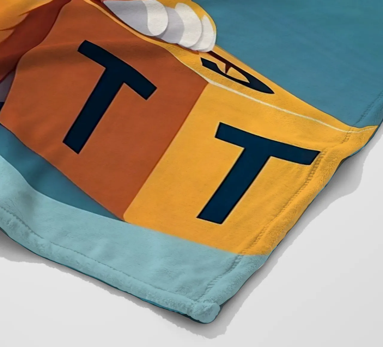 Cute tiger cub playing with a block with the letter T fleece blanket by DesignDoodle