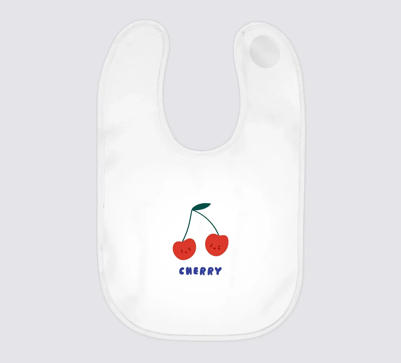 Cherry bavoir de Mottos by Sinan Saydik