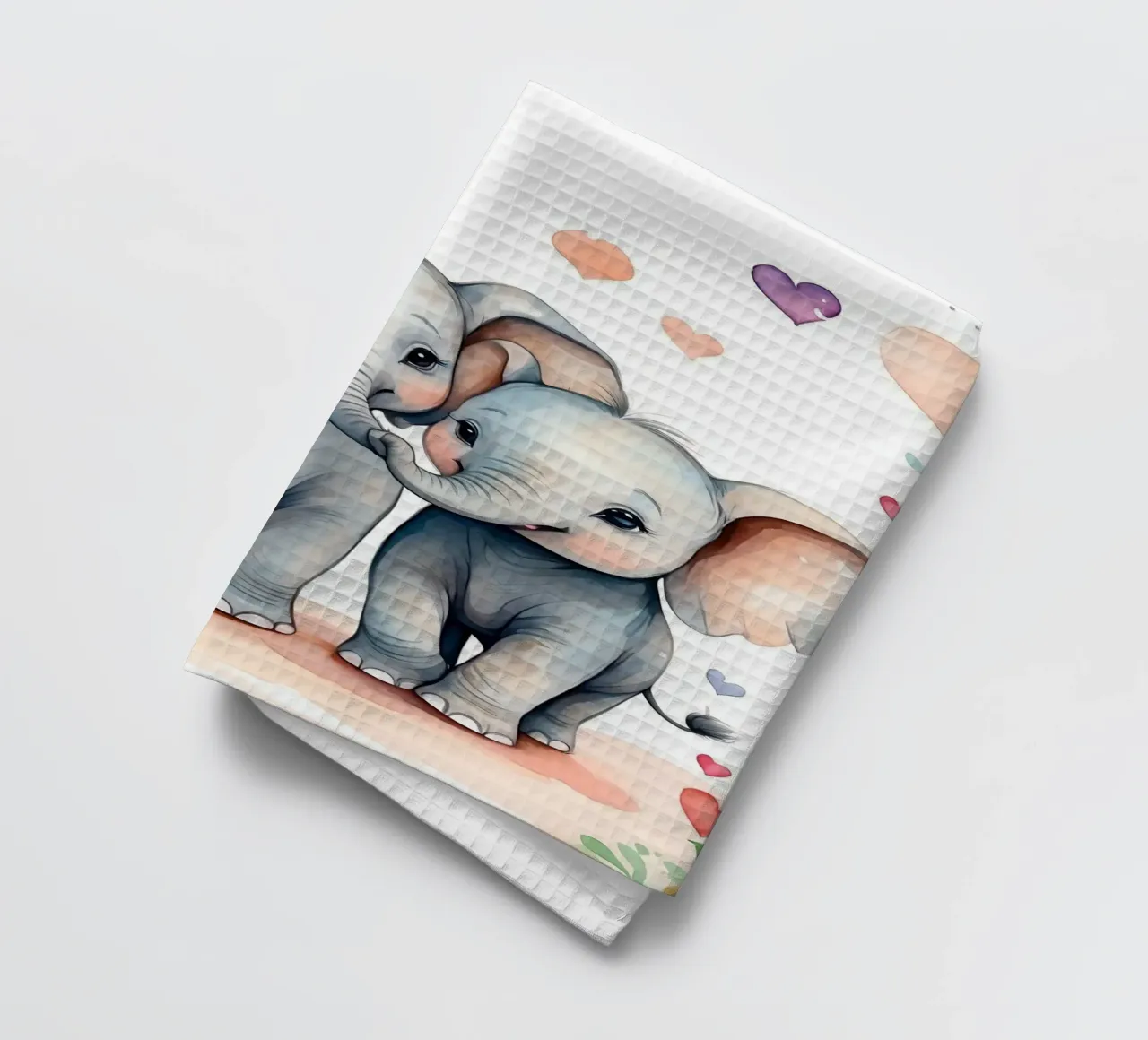 d'adorables éléphants s'amusant à se toucher la trompe, des cœurs autour d'eux torchon de DesignDoodle