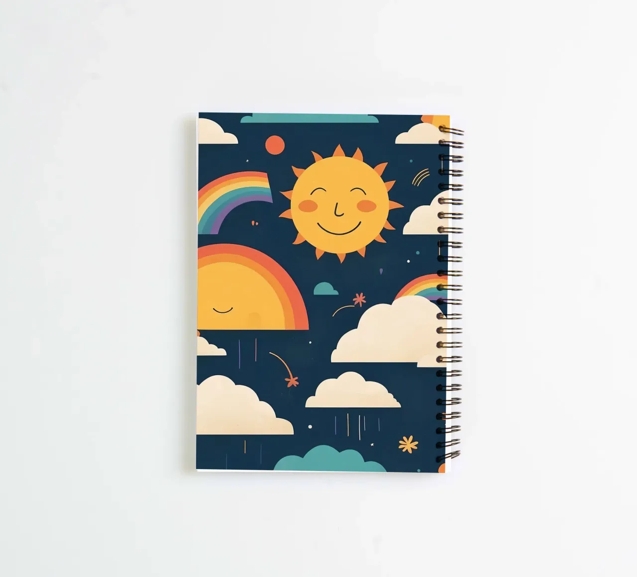 Whimsical pattern depicting smiling suns, rainbows, & clouds spiral notebook by DesignDoodle