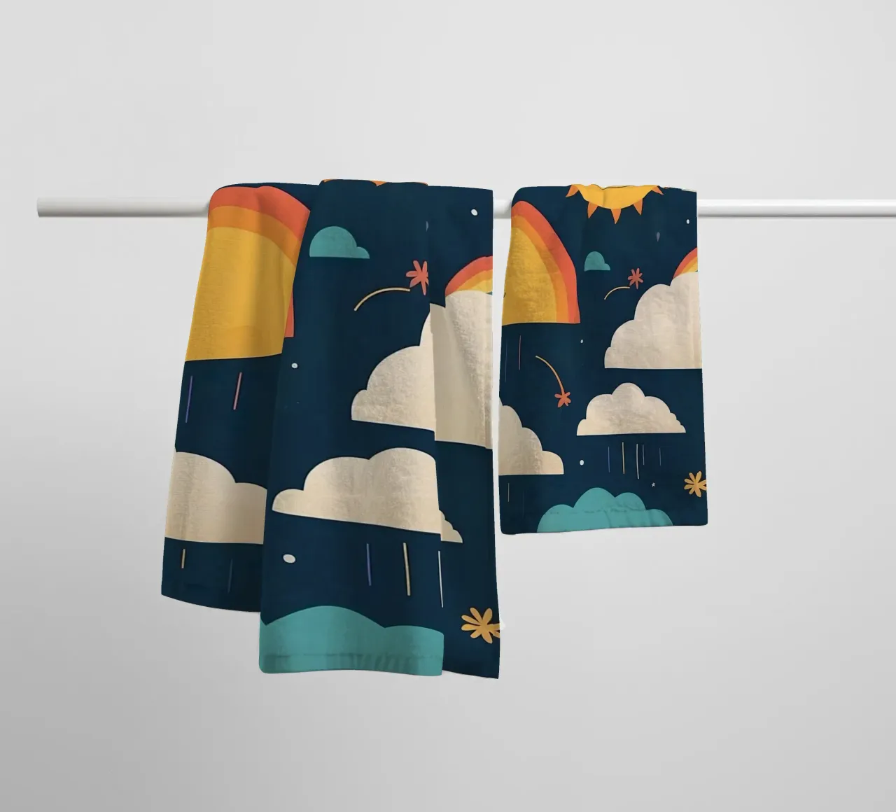 Whimsical pattern depicting smiling suns, rainbows, & clouds towel by DesignDoodle