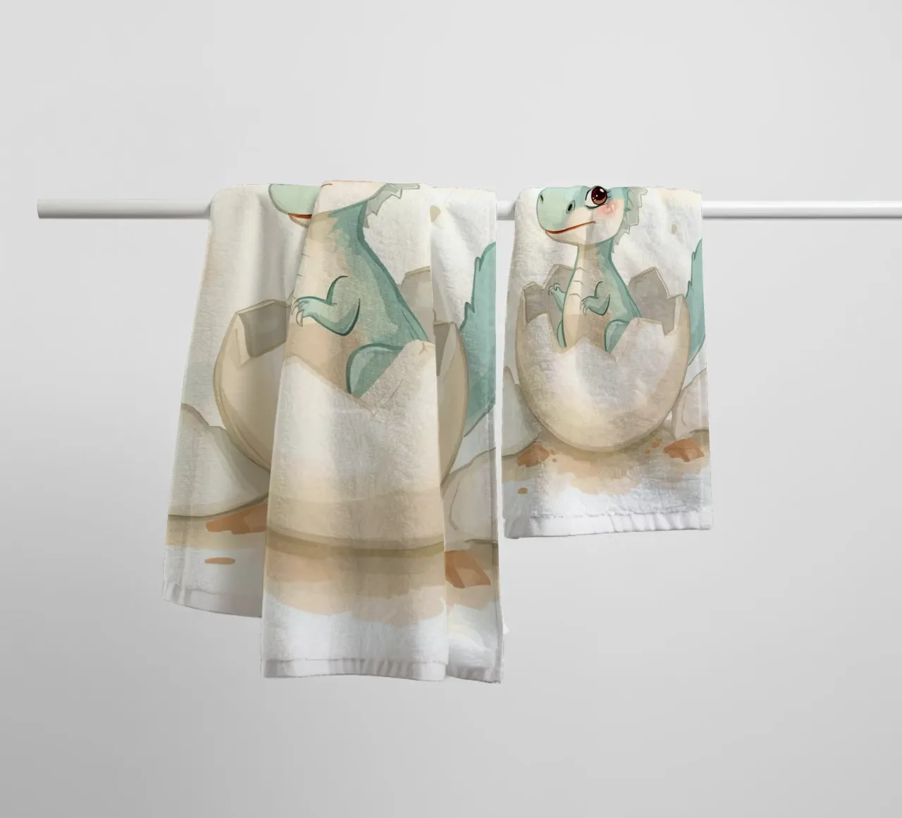 Little dinosaur hatching from an egg in watercolor style towel by DesignDoodle