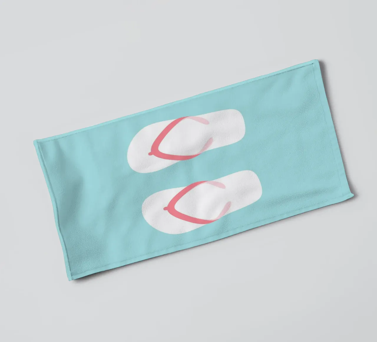Flip flops on blue towel by janamossmann