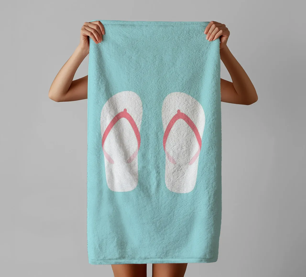 Flip flops on blue towel by janamossmann