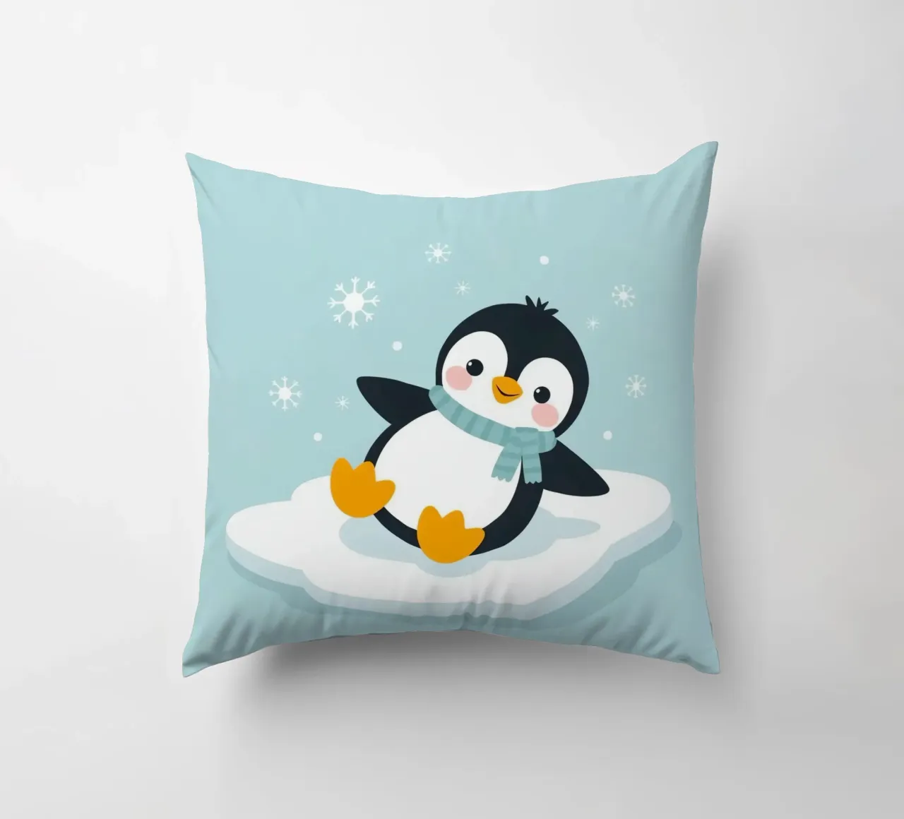 Un simpatico pinguino con sciarpa azzurra riposa su un ghiaccio bianco cuscino da DesignDoodle