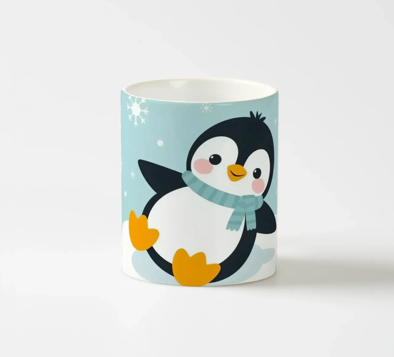 Un simpatico pinguino con sciarpa azzurra riposa su un ghiaccio bianco tazza in ceramica da DesignDoodle