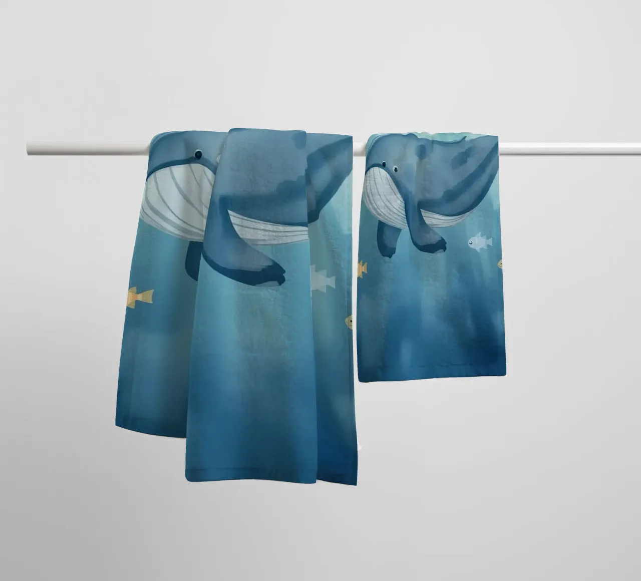 Whale swimming in the ocean with sunlight shining towel by DesignDoodle