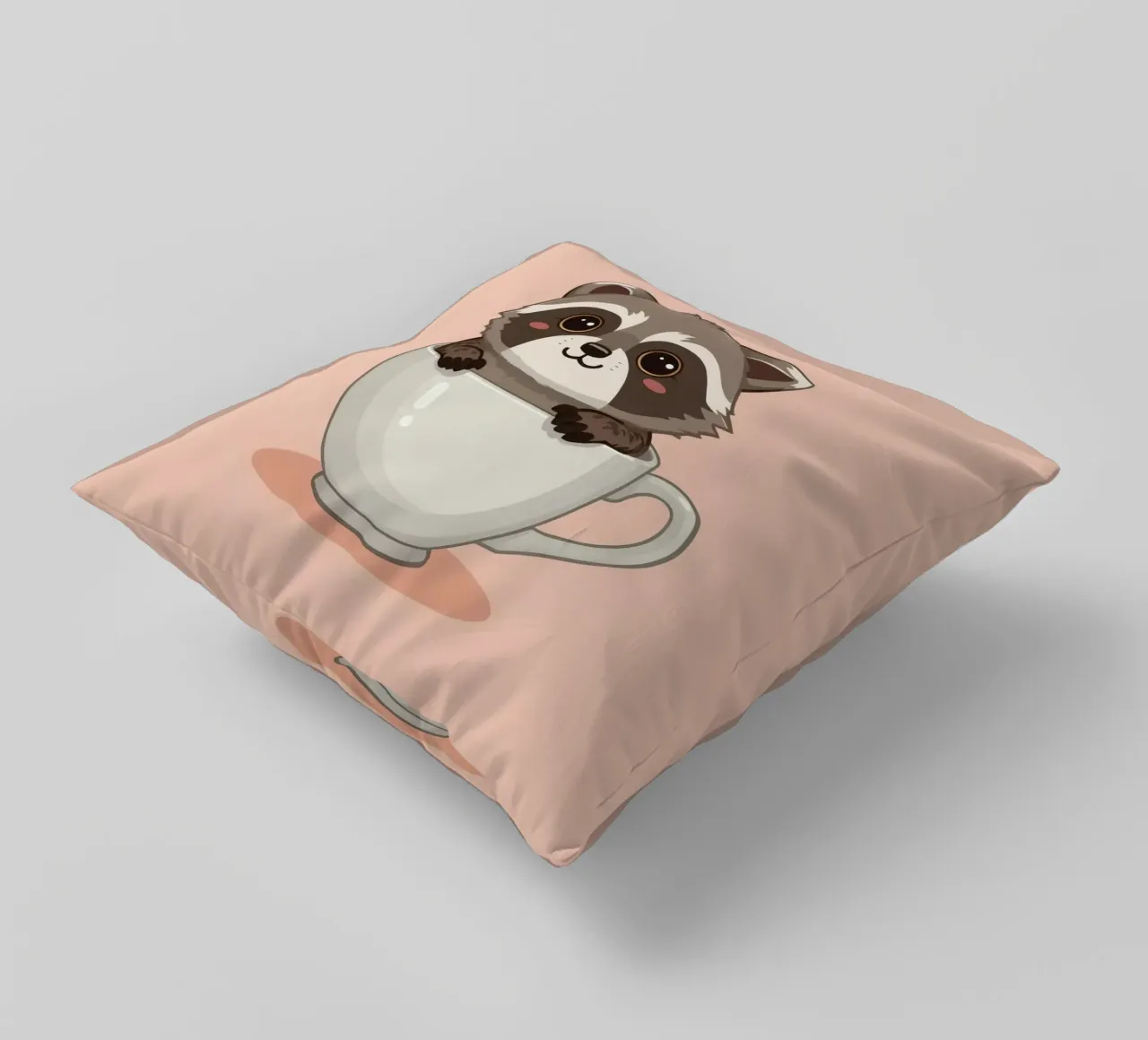 Procione dei cartoni animati seduto all'interno di una tazza da tè bianca con manico cuscino da DesignDoodle
