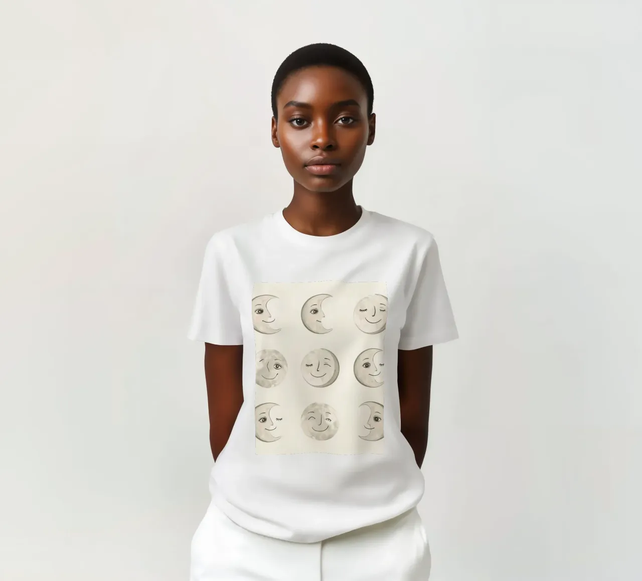 Smiling Moon Faces in Different Phases with Various faces t-shirt by DesignDoodle