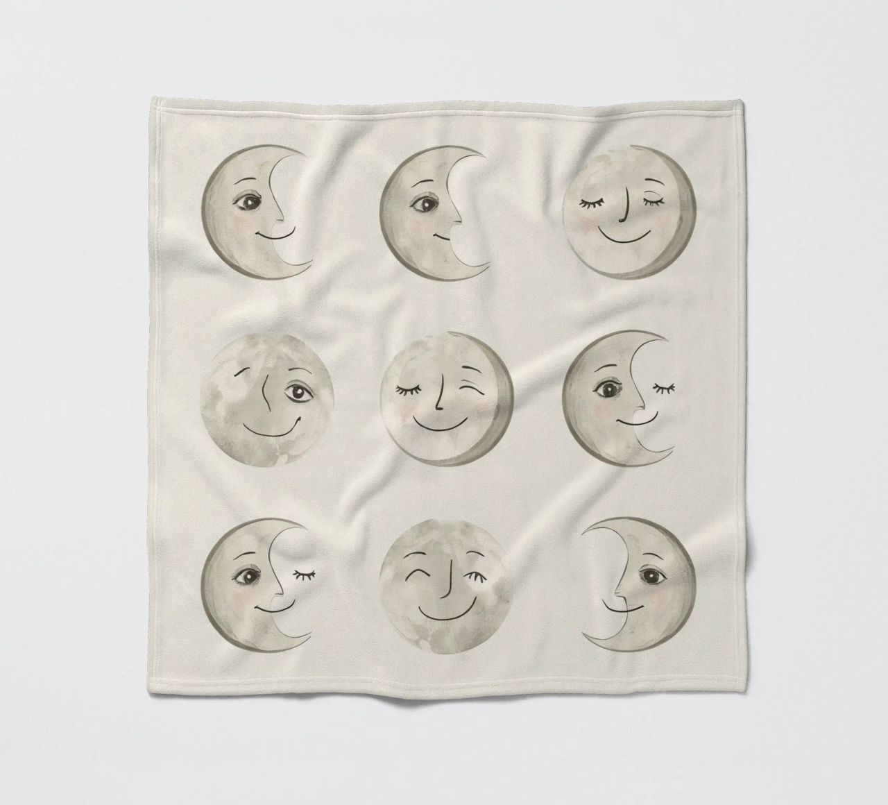 Smiling Moon Faces in Different Phases with Various faces fleece blanket by DesignDoodle