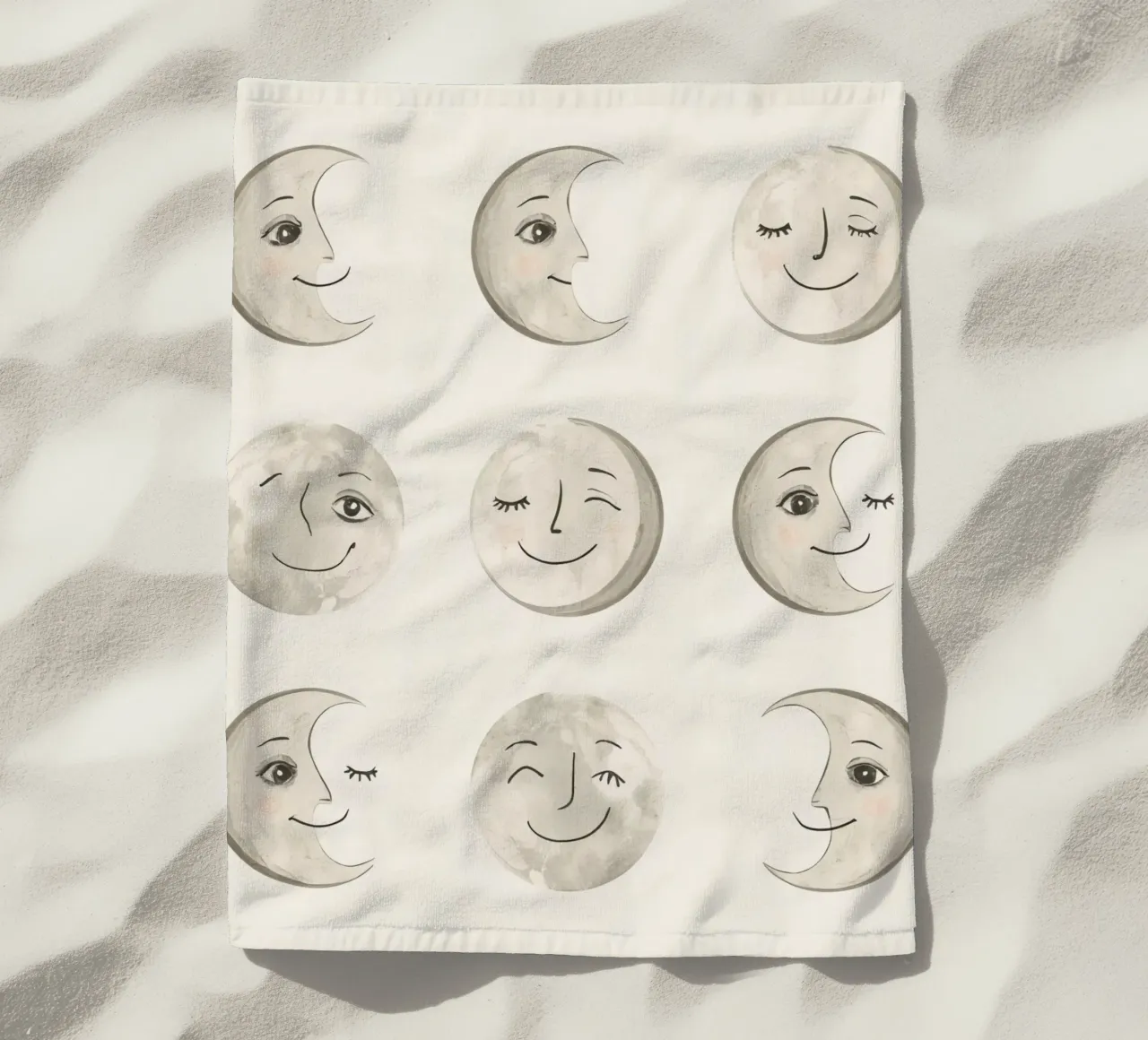 Smiling Moon Faces in Different Phases with Various faces beach towel by DesignDoodle
