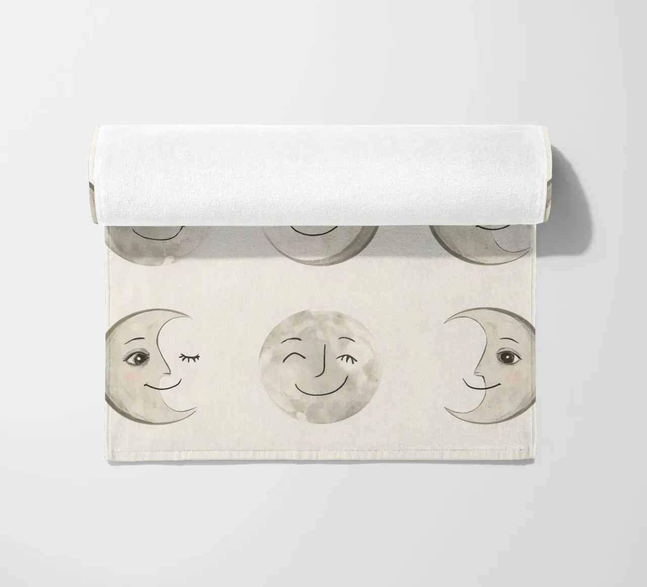 Smiling Moon Faces in Different Phases with Various faces beach towel by DesignDoodle