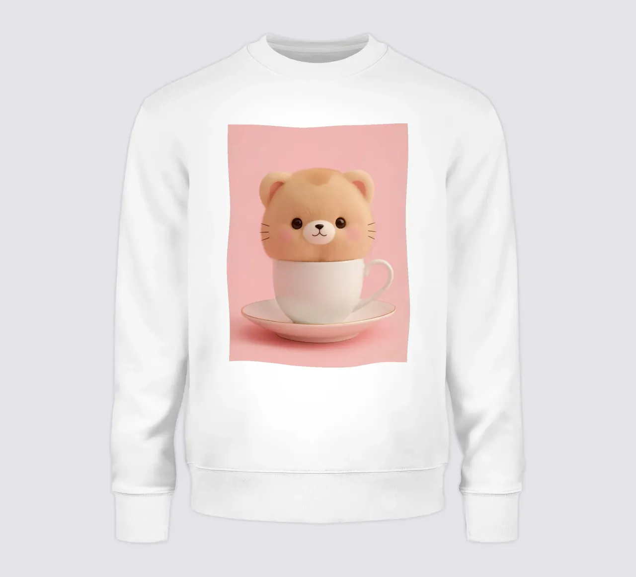 Un simpatico orsetto di peluche si trova all'interno di una tazza da tè bianca su un supporto coordinato. felpa da DesignDoodle