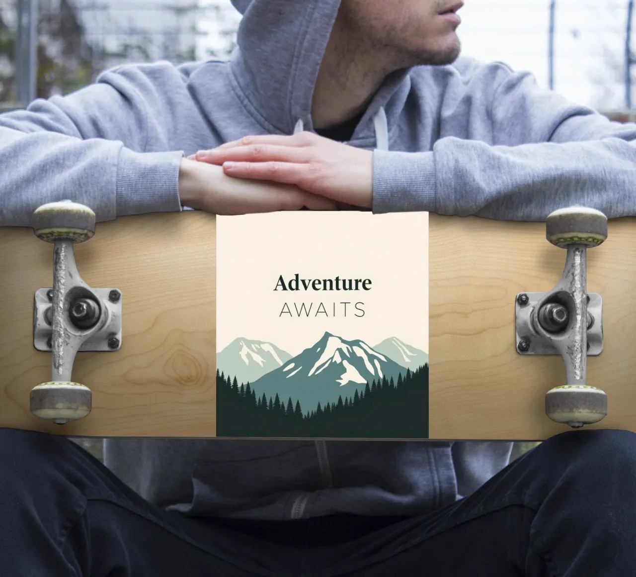 Mountains and trees art with text 'Adventure Awaits' sticker by DesignDoodle