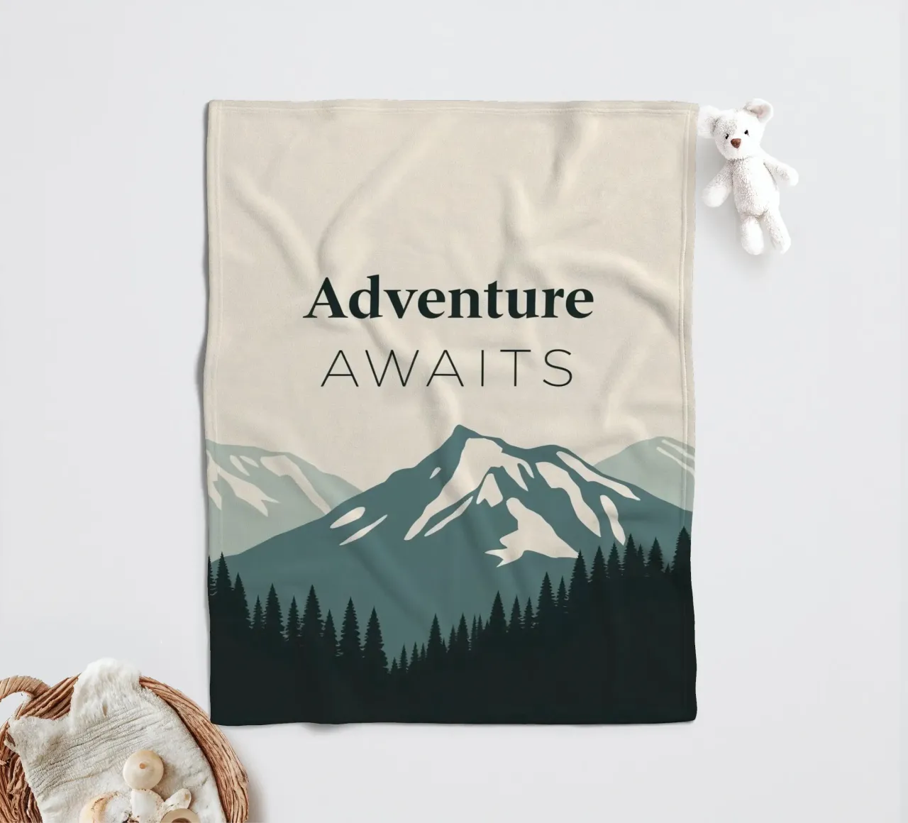 Mountains and trees art with text 'Adventure Awaits' fleece blanket by DesignDoodle