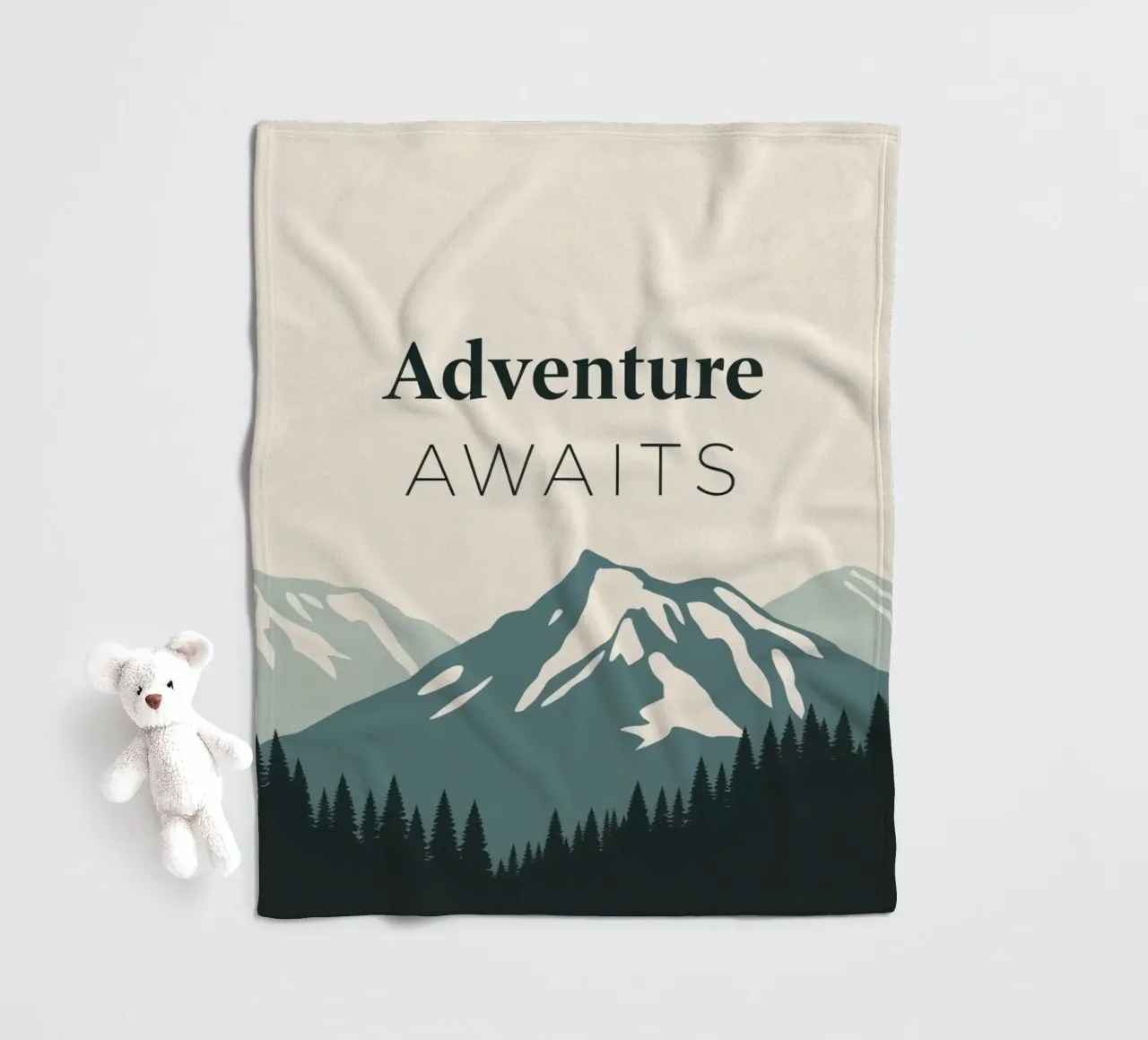 Mountains and trees art with text 'Adventure Awaits' fleece blanket by DesignDoodle