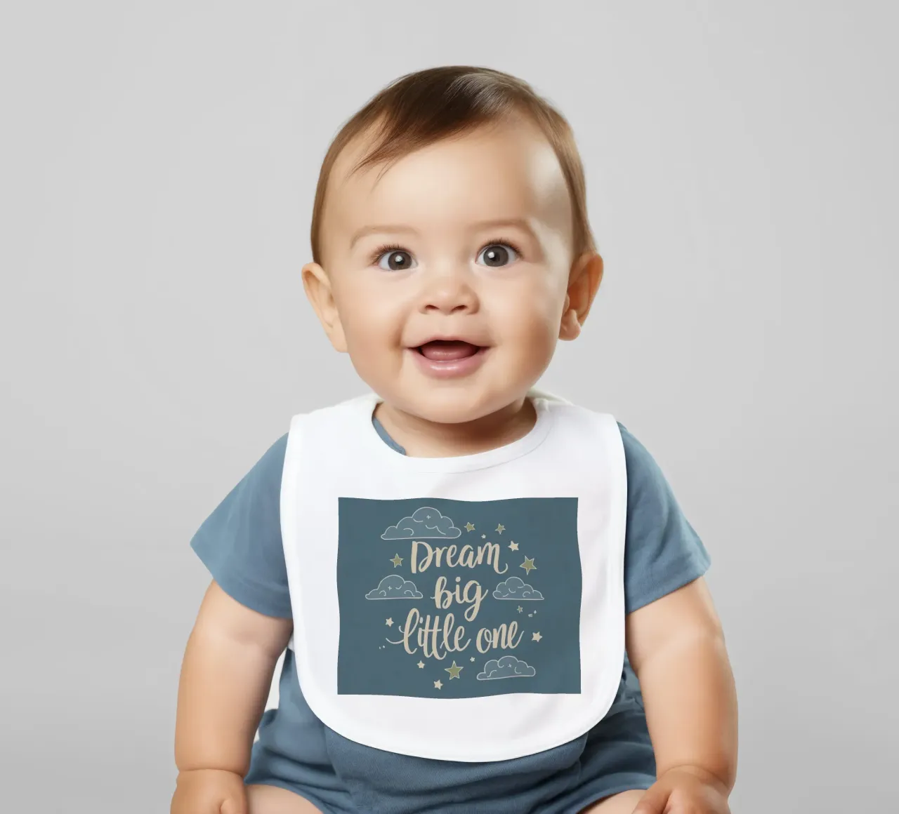 Dream big little one typography with clouds and stars baby bib by DesignDoodle