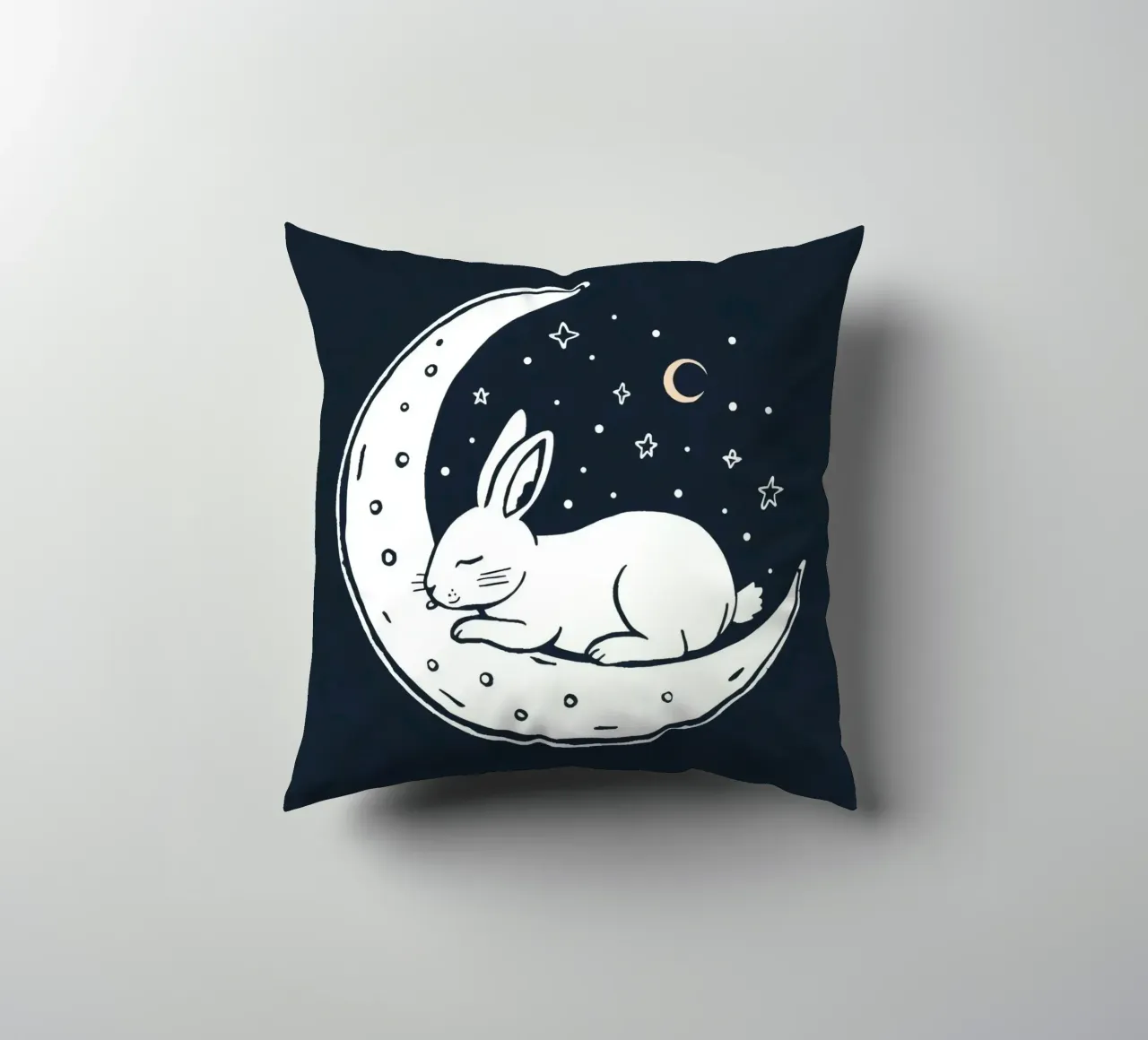 Sleeping bunny resting on crescent moon surrounded by stars decorative cushion by DesignDoodle