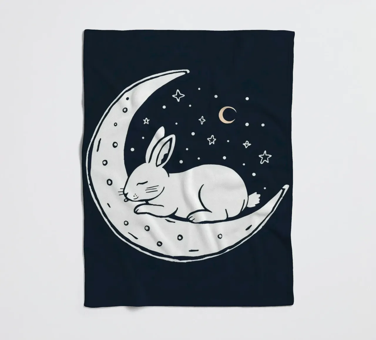 Sleeping bunny resting on crescent moon surrounded by stars fleece blanket by DesignDoodle