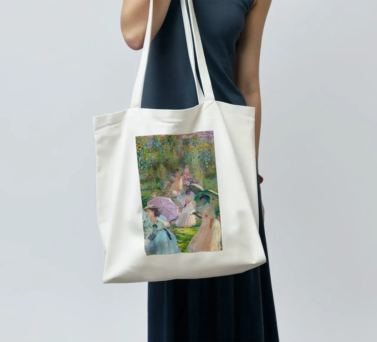 woman with umbrella in the middle of the park tote bag by SMG Store