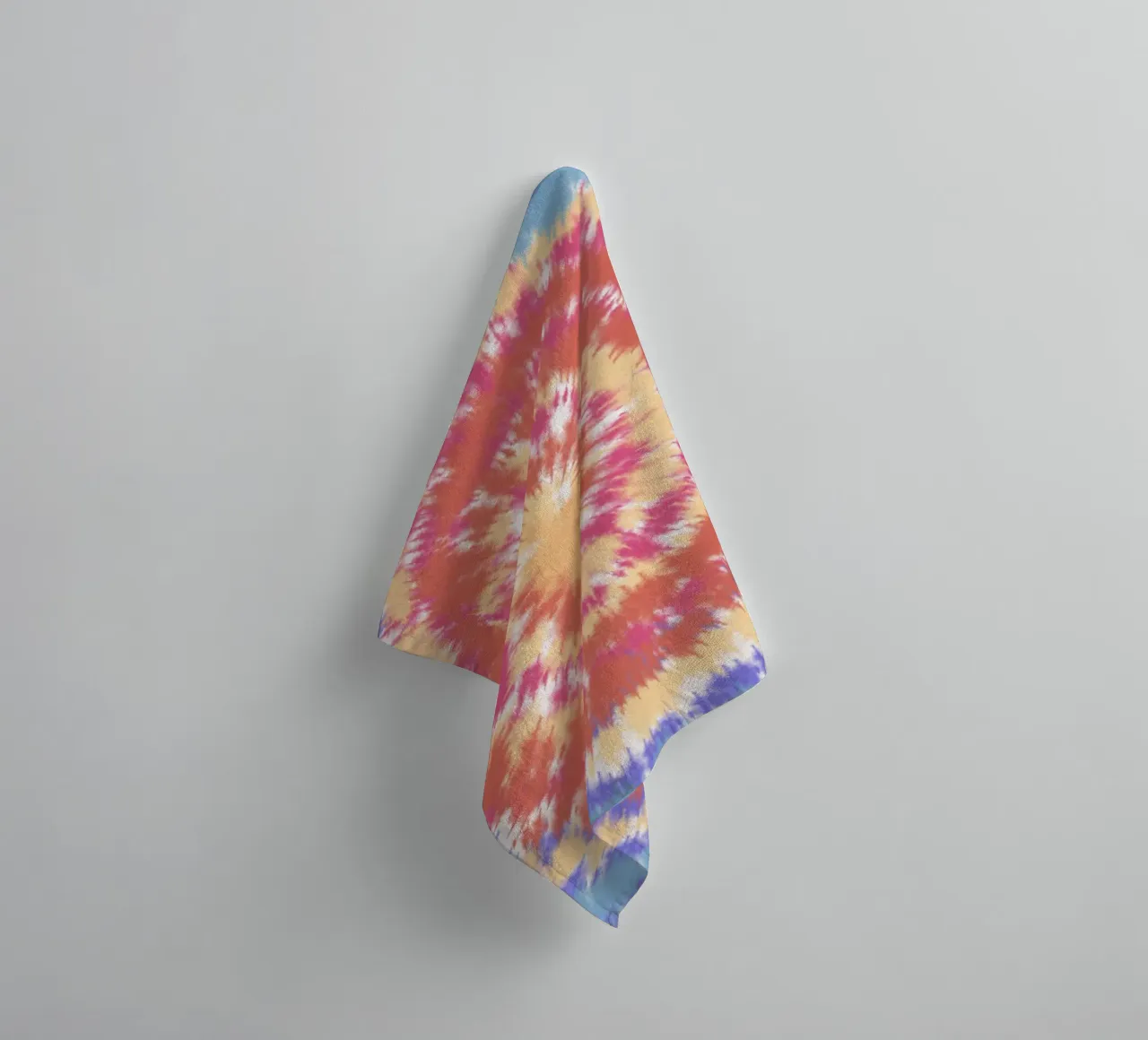 Radial pattern tie dye towel by Little Dean