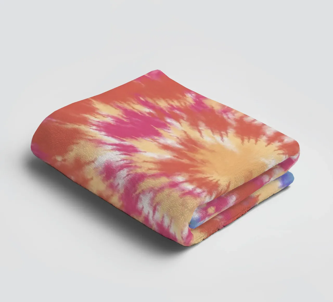 Radial pattern tie dye towel by Little Dean