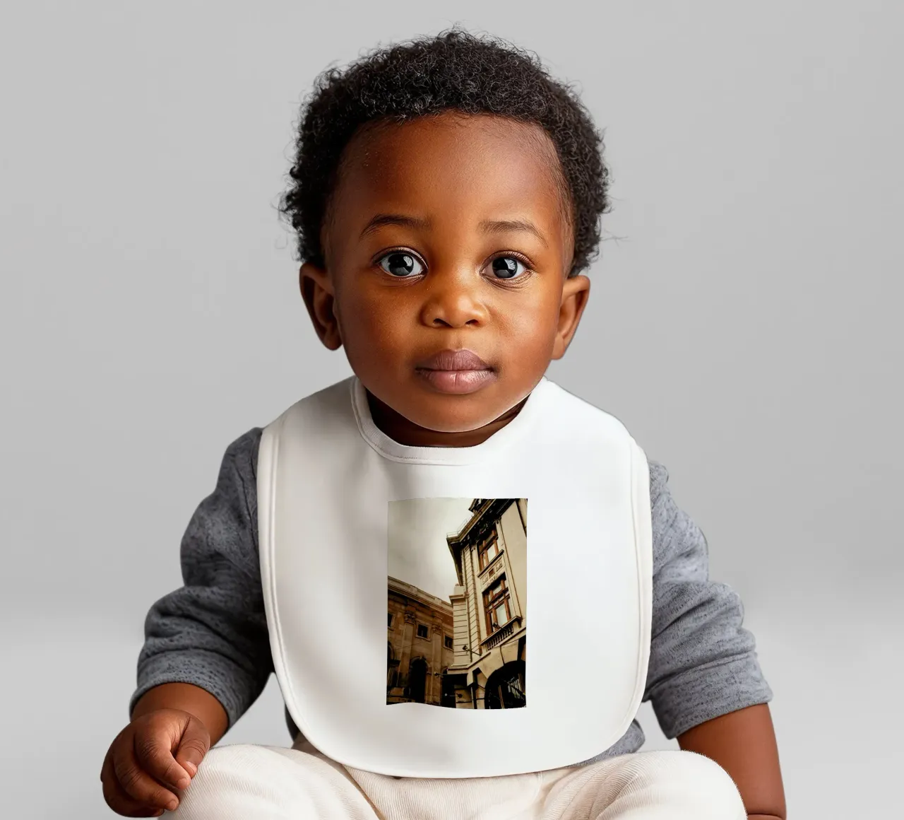 Analog Series The Corner baby bib by Sebastian Hilgetag