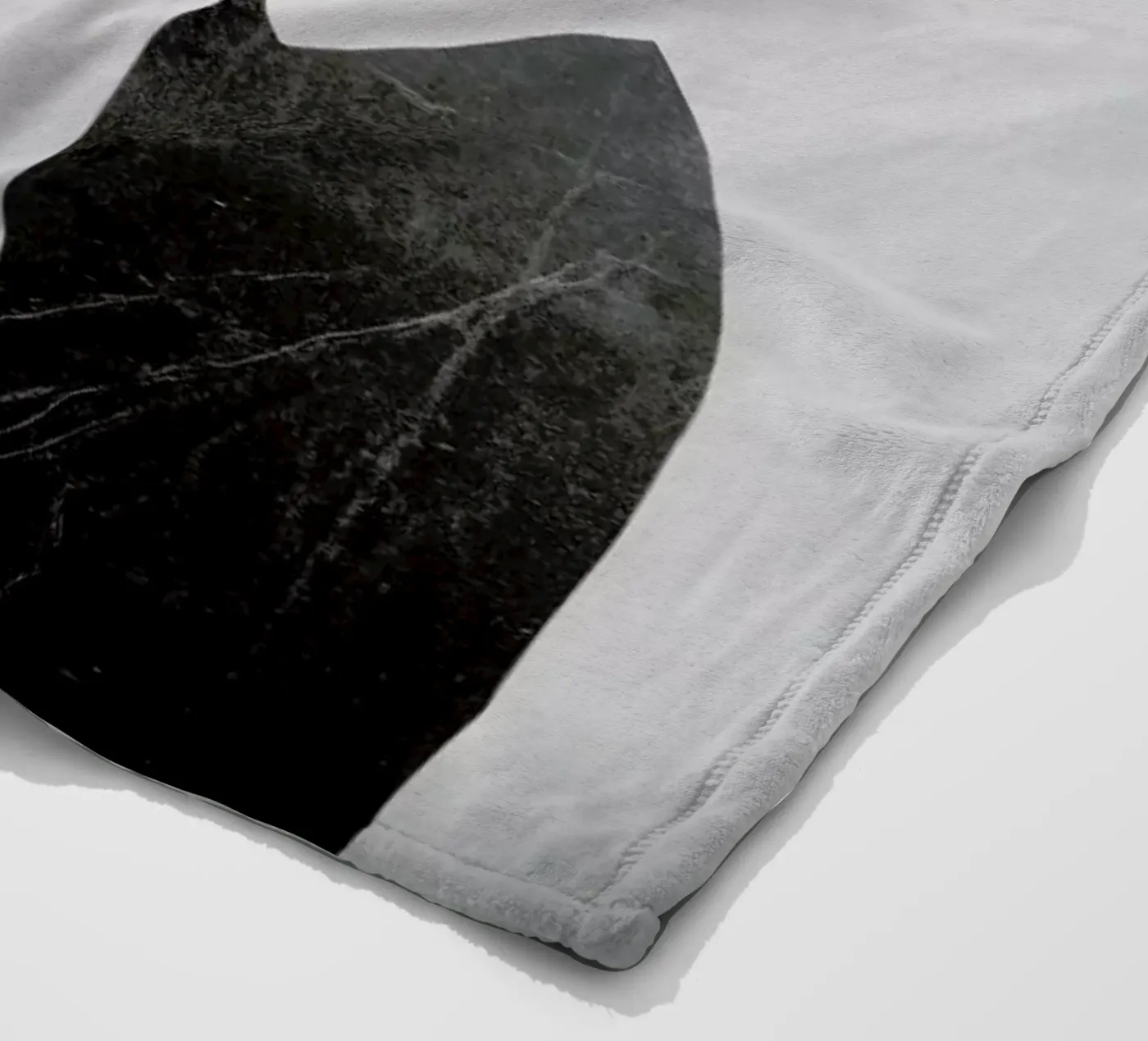 A Reflection fleece blanket by Ruben Ireland