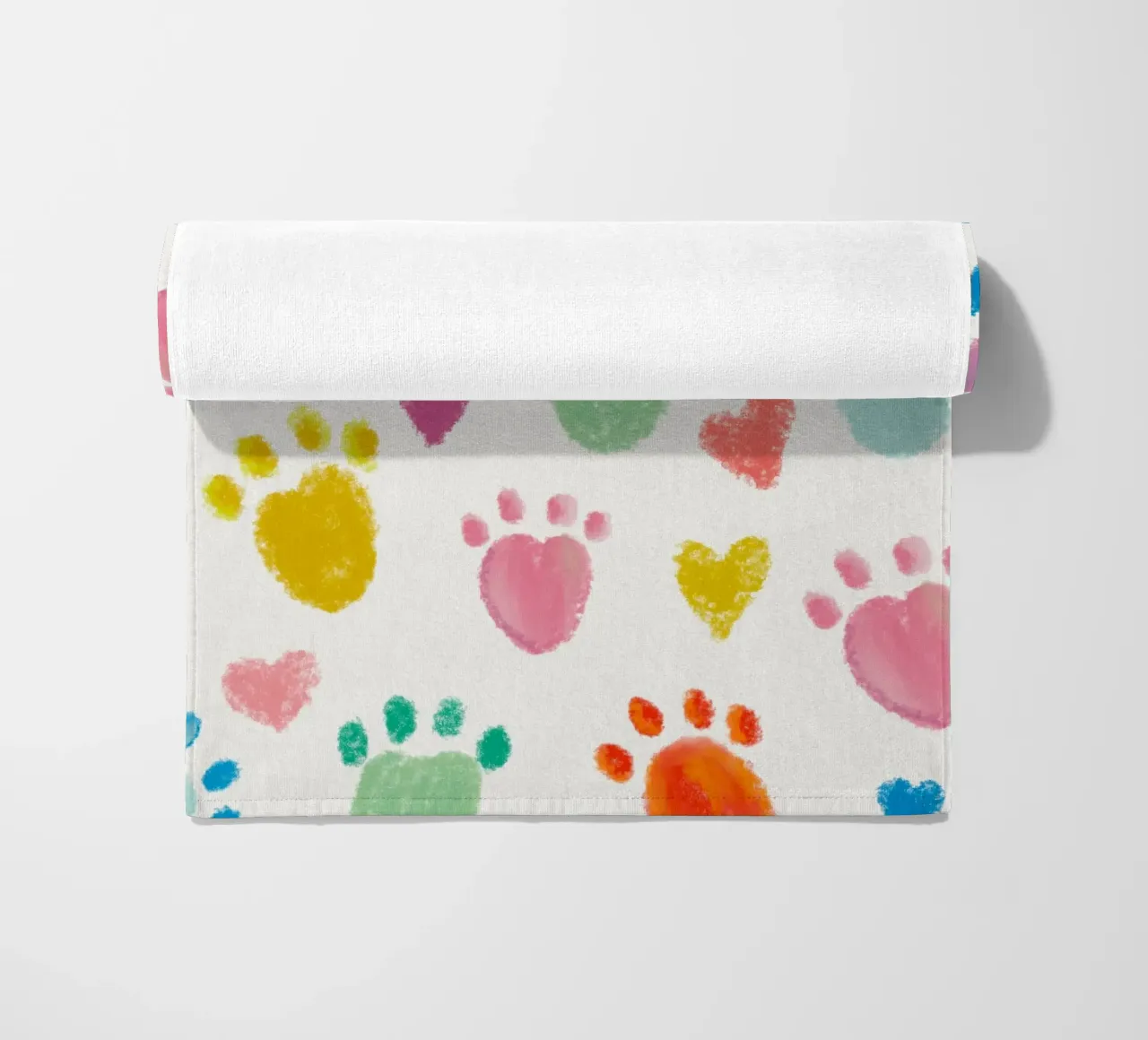 Colorful pastel colored paw print beach towel by gulsengunel