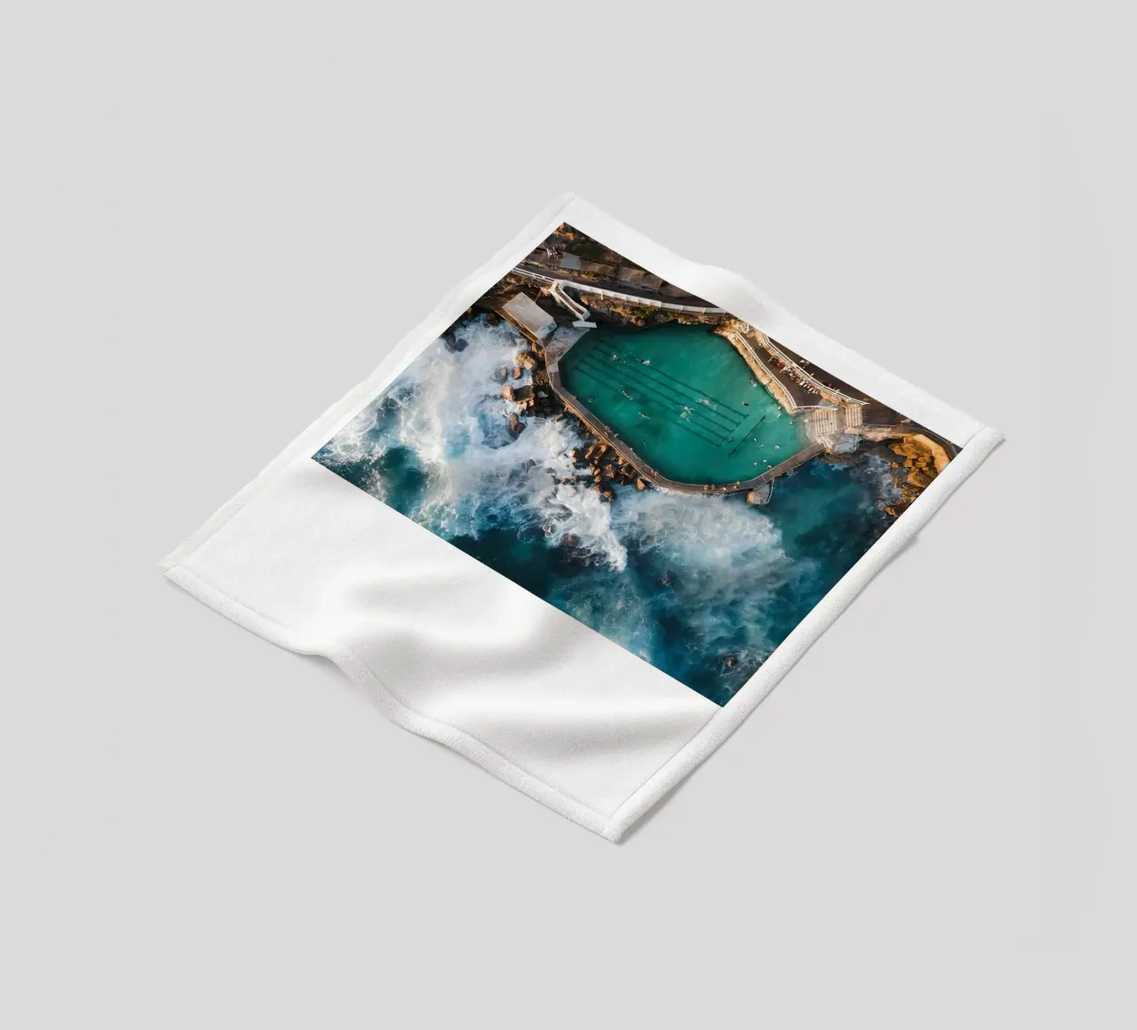 Bronte Beach Rock Pool fleece blanket by Slim Aarons Vintage