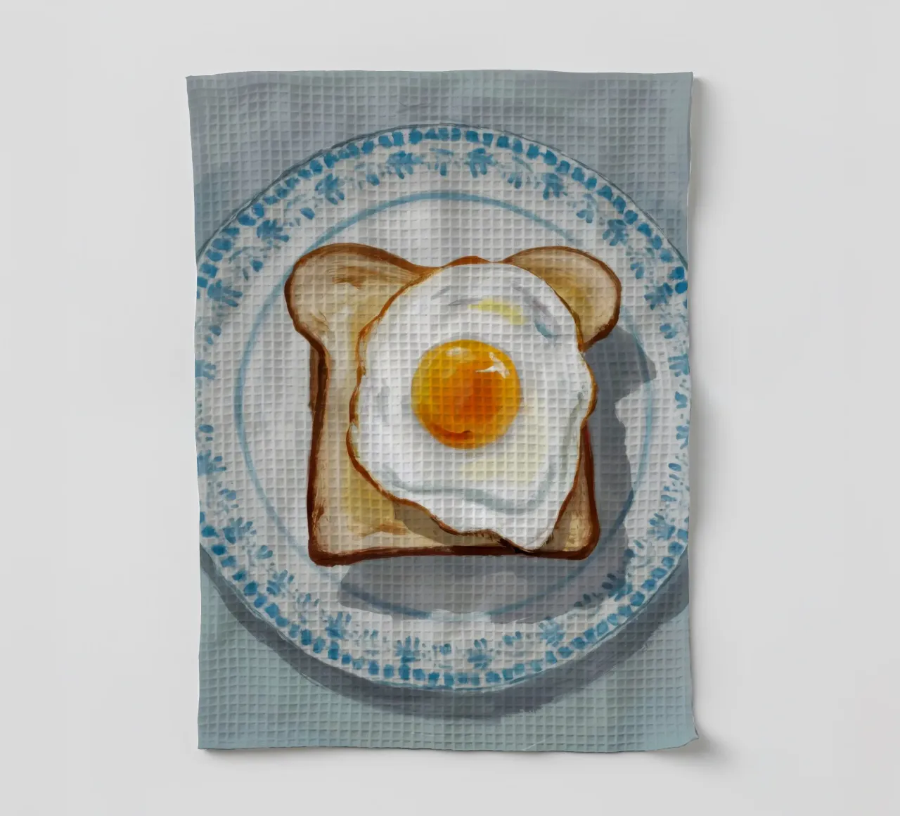 Assiette d'œufs sur toast torchon de Tiga Bersama