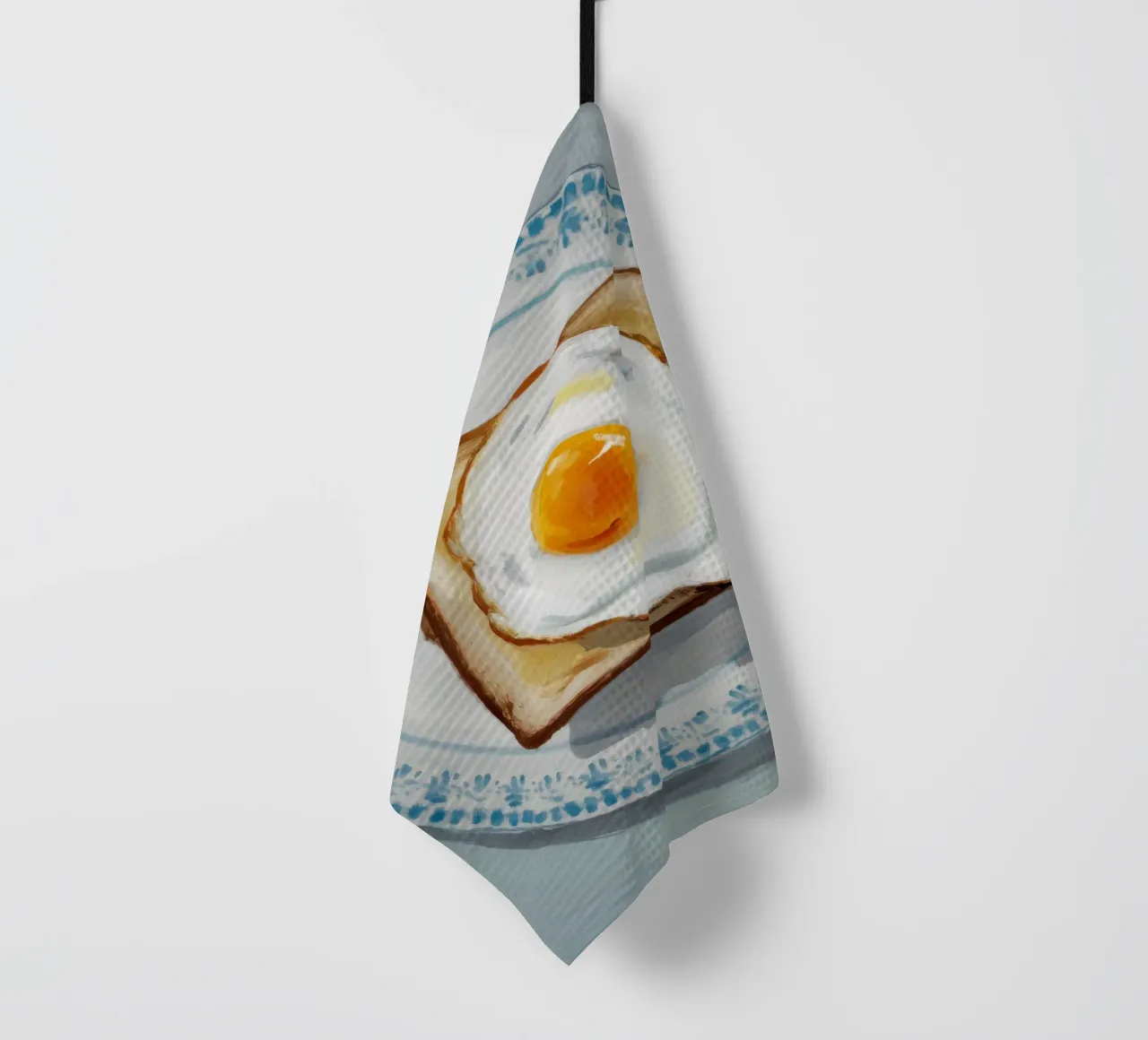 Assiette d'œufs sur toast torchon de Tiga Bersama