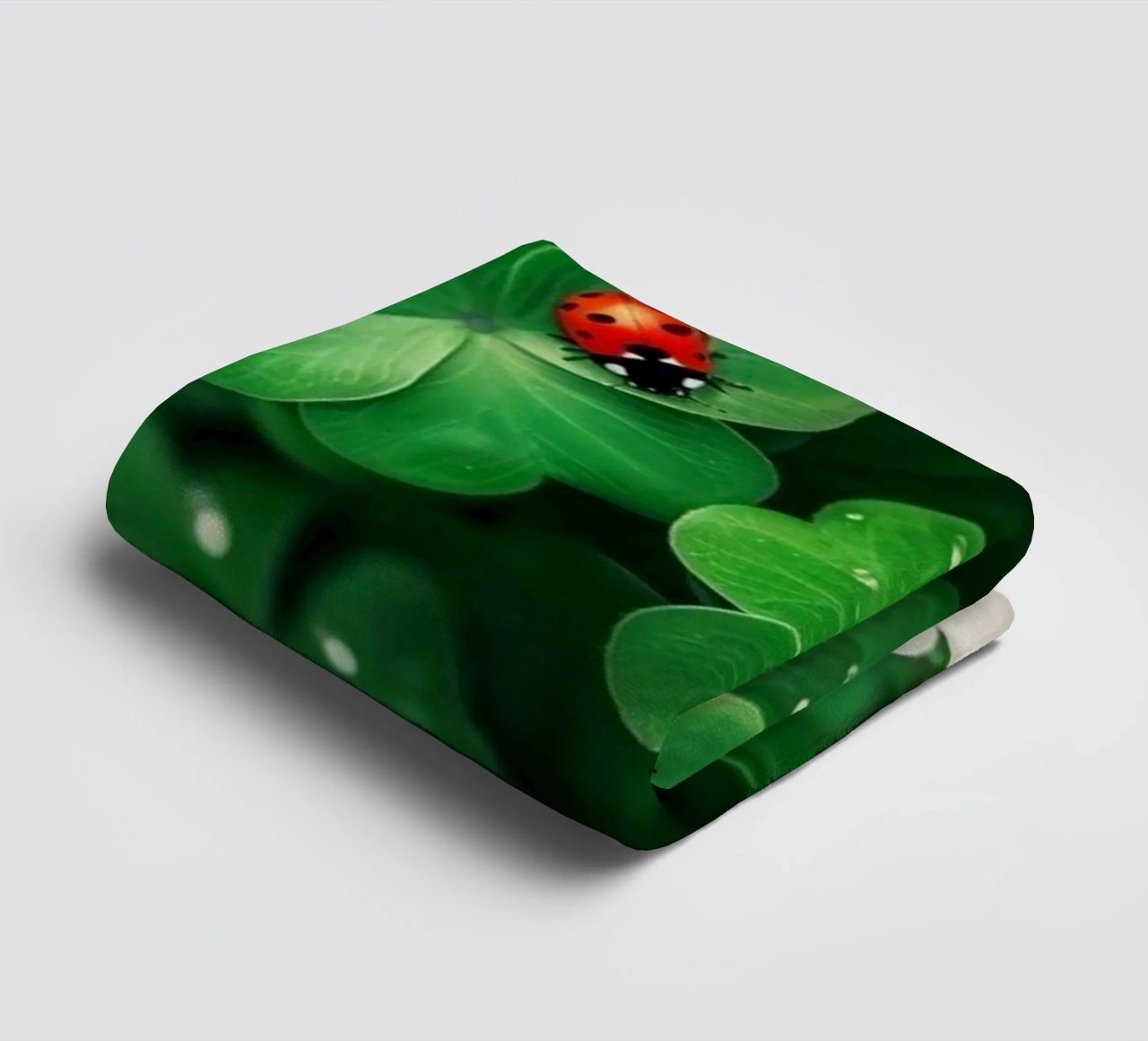 Clover & Ladybug towel by graphic design