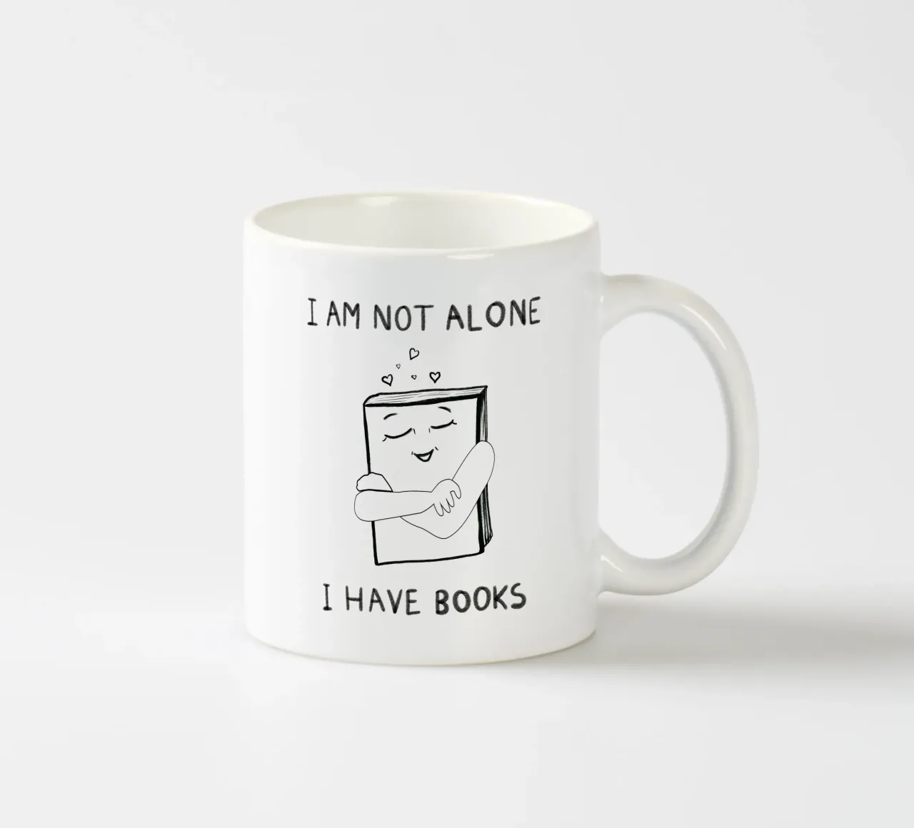 I am not alone I have book text ceramic mug by gulsengunel
