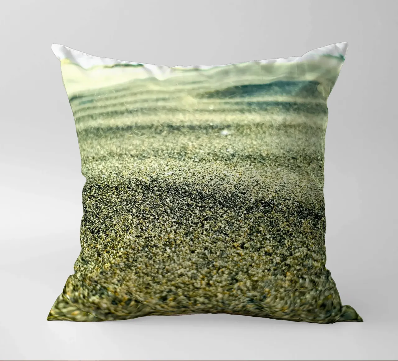 desert with green decorative cushion by life of sands