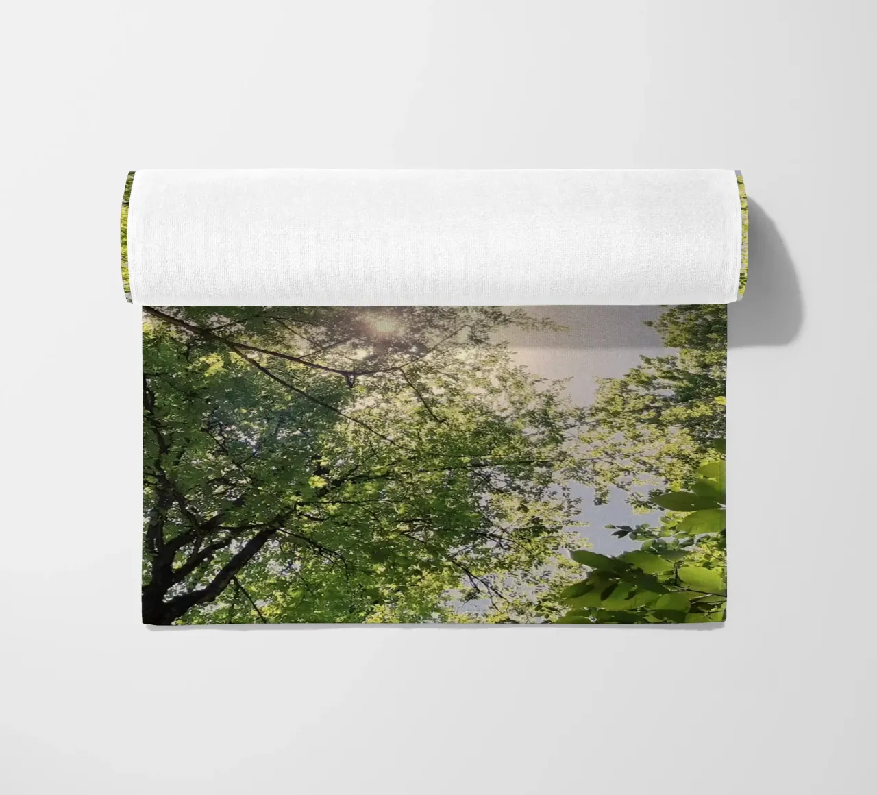 sunlight through trees beach towel by space words