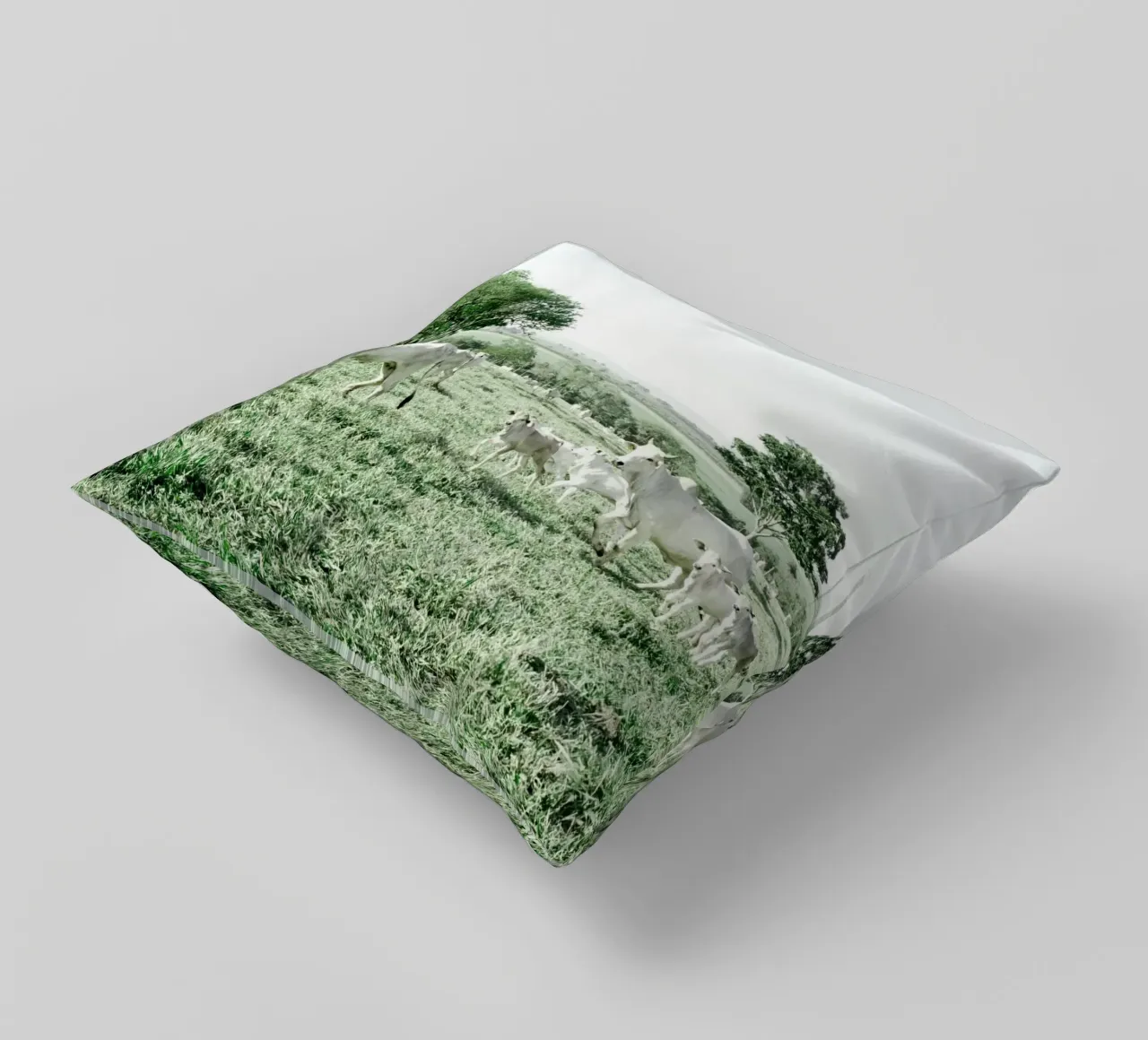 Mucche bianche in un campo verde cuscino da KISSA STUDIO