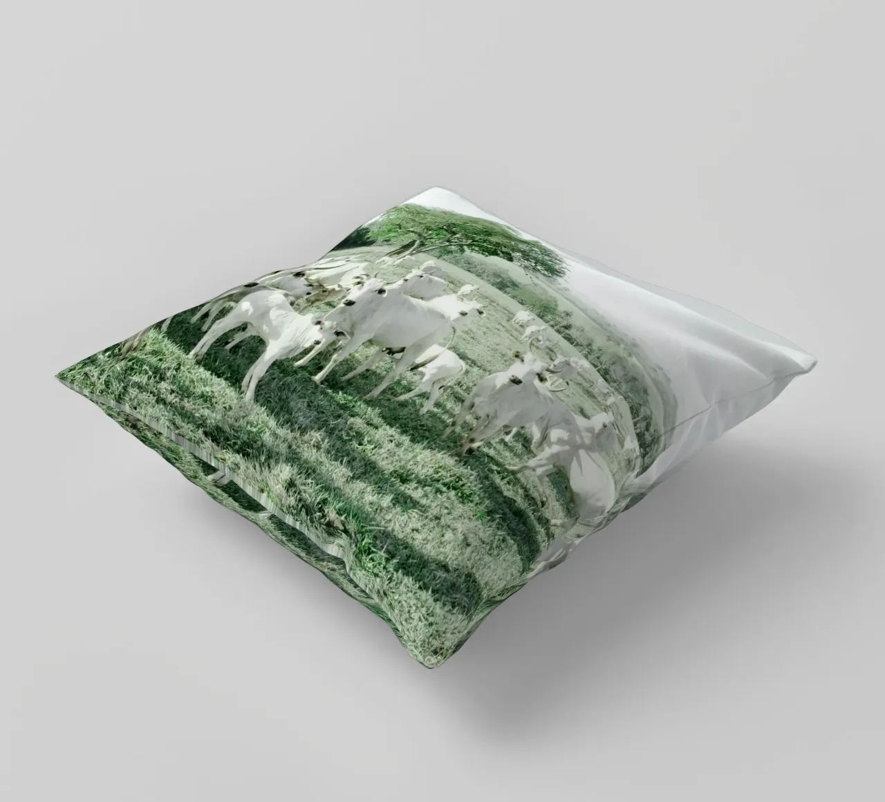 Mucche bianche in un campo verde cuscino da KISSA STUDIO