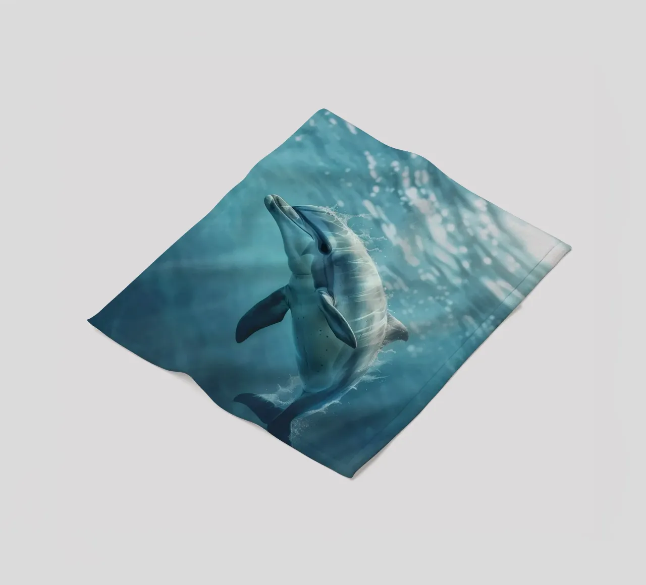 The Joyful Dolphin: Dancing Beneath the Waves fleece blanket by DesignDoodle