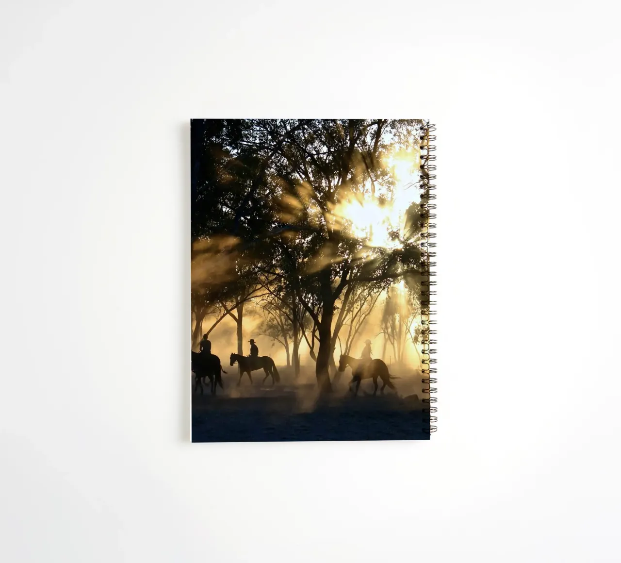 sunlight through trees and riders spiral notebook by Horsire