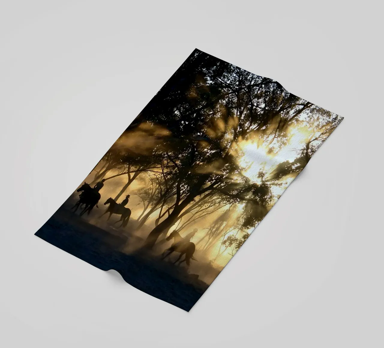 sunlight through trees and riders beach towel by Horsire
