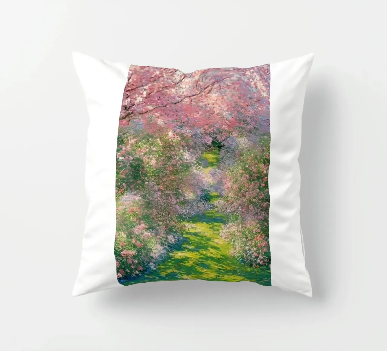 giardino con alberi a fiori rosa e sentieri per passeggiate cuscino da SMG Store
