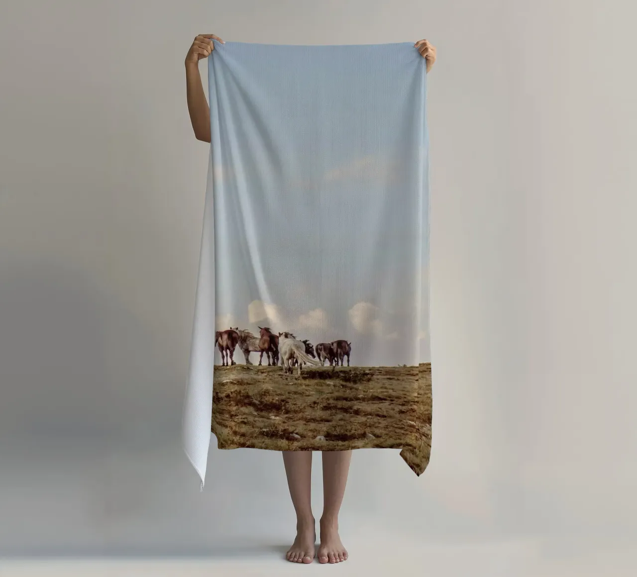 herd horses pasture beach towel by Horsire
