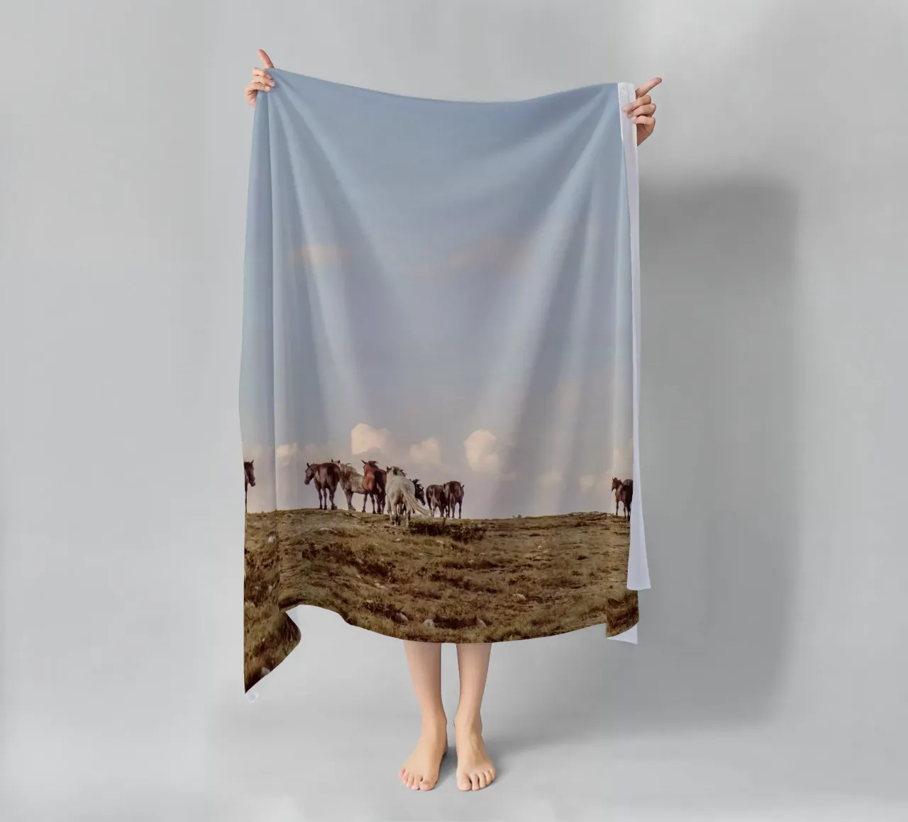 herd horses pasture beach towel by Horsire