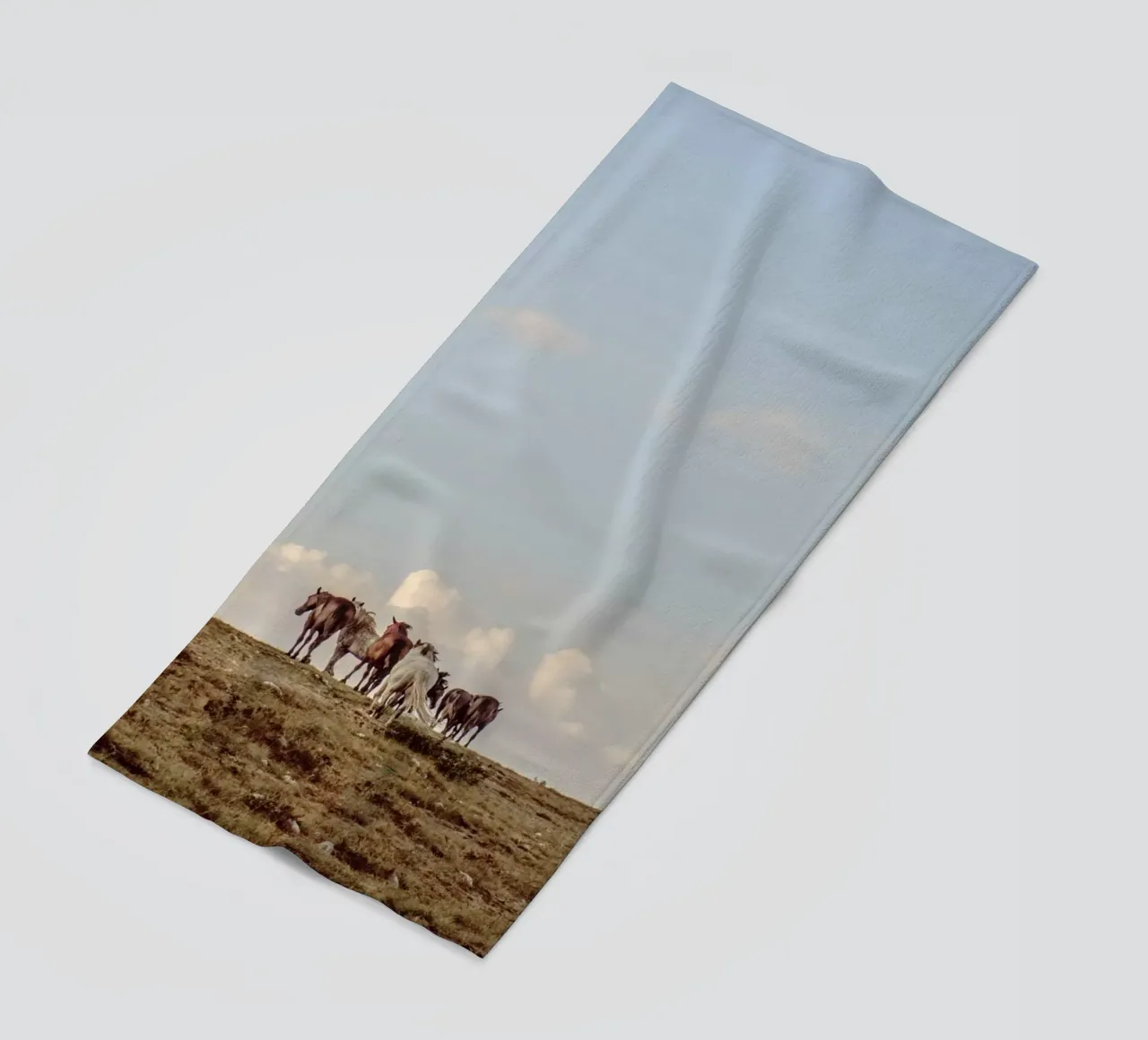 herd horses pasture beach towel by Horsire